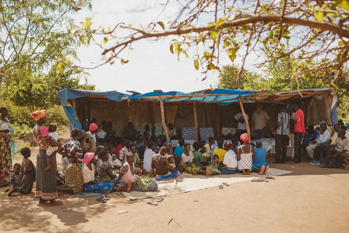 A rural South Sudanese congregation gathered outdoors for ministry